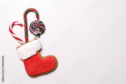 Christmas cookie boots and candy isolated on white background