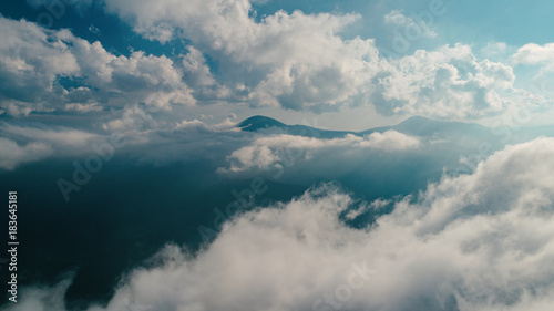 Cloud scape above carpathian mountains shot at sunset