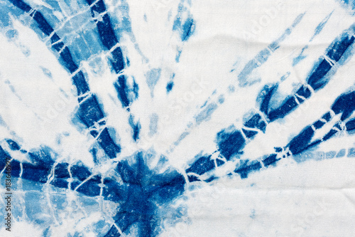 The fabric indigo tie dye as a background and texture.
