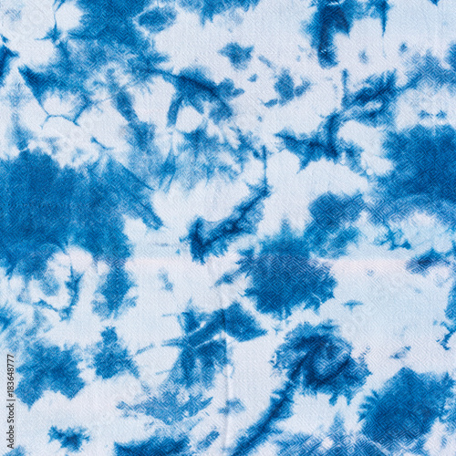 The fabric indigo tie dye as a background and texture.