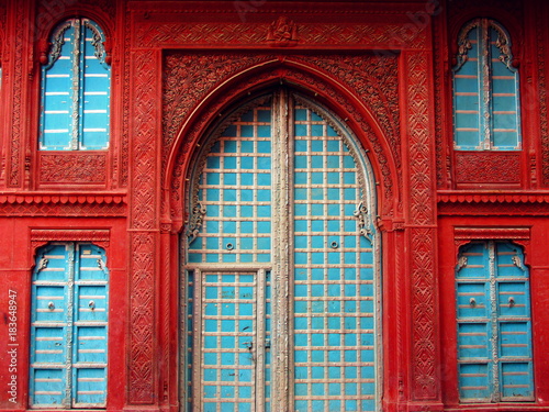 Indian Haveli in Rajasthan - Indian doors and windows. House facade.