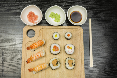 Board with a sushi set.