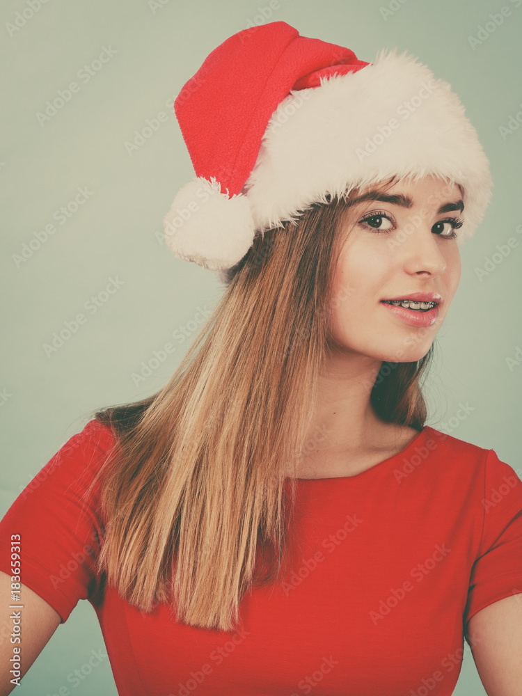 Woman wearing Santa Claus helper costume Woman wearing Santa Claus helper costume