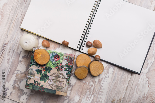 Empty notebook paper with holiday decotations photo