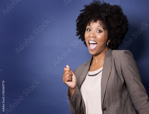 black casual woman on blue background photo