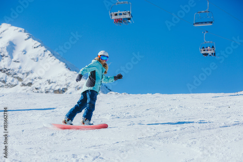 Snowboarder in the mountains 