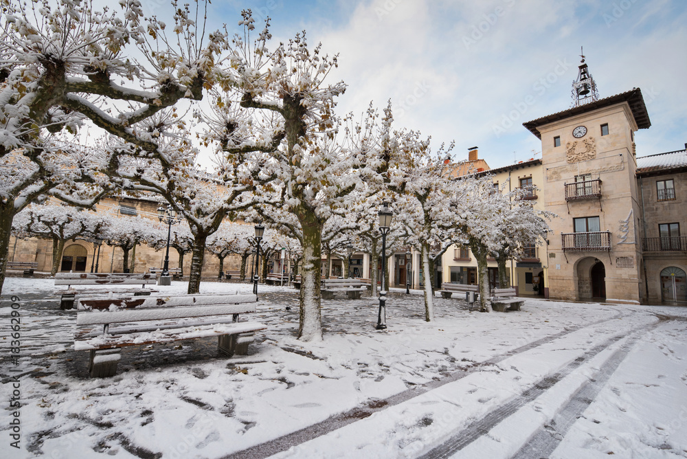 Winter scene of a snowed cityscape landscape of the ancient village of Briviesca in Burgos Province, Castilla y Leon, Spain. Winter scene of a snowed cityscape landscape of the ancient village of Briviesca in Burgos Province, Castilla y Leon, Spain.