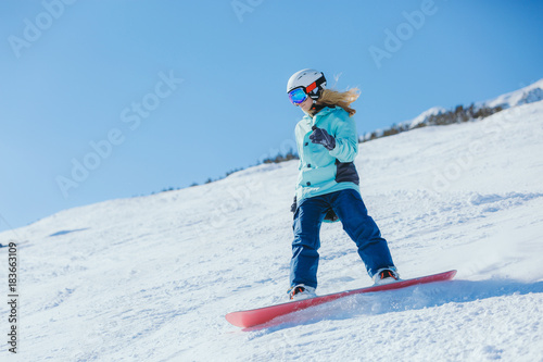 Snowboarder in the mountains 