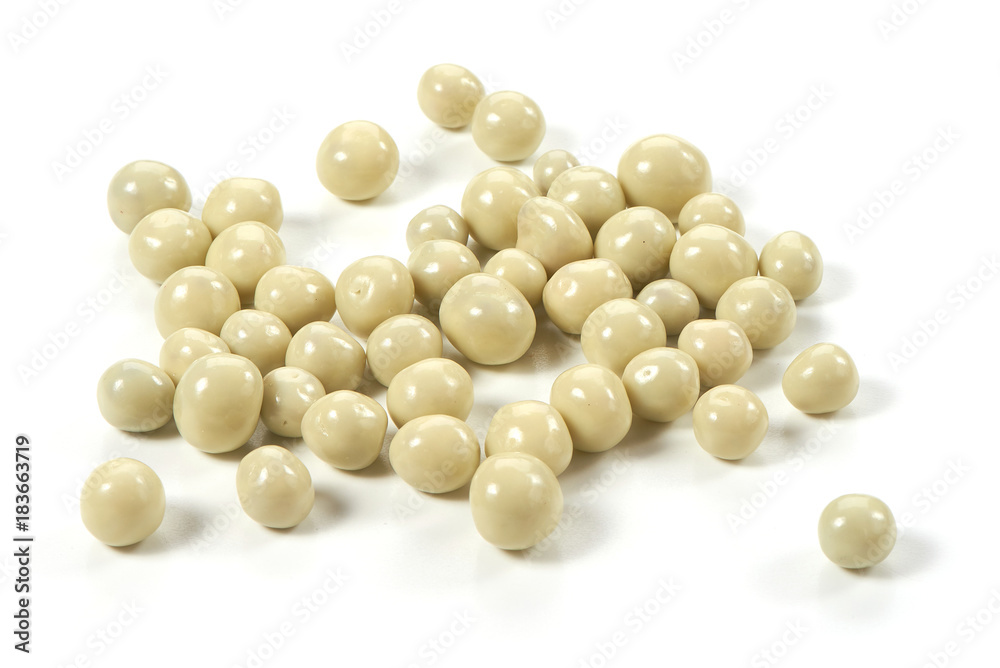 Dried berries in a white chocolate, close-up, isolated on white background. Dried berries in a white chocolate, close-up, isolated on white background.