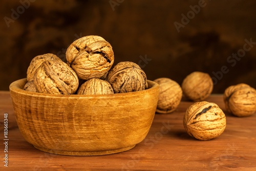 Walnuts on a wooden table. Healthy food. Sale of nuts. Advertising for walnuts.