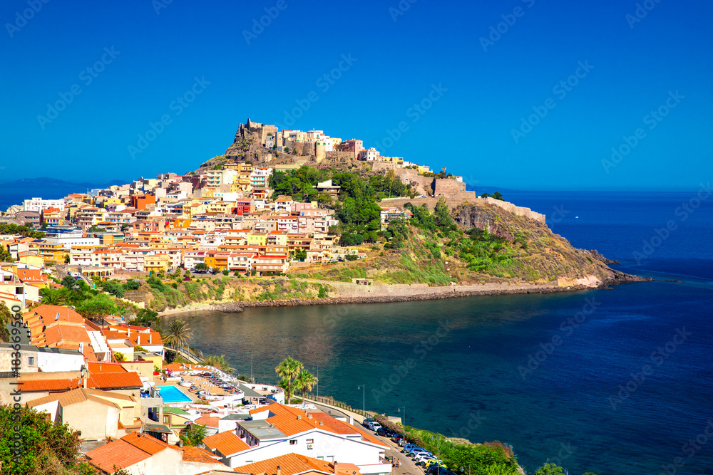Castle and colorful houses in Castelsardo town, Sardinia, Italy.