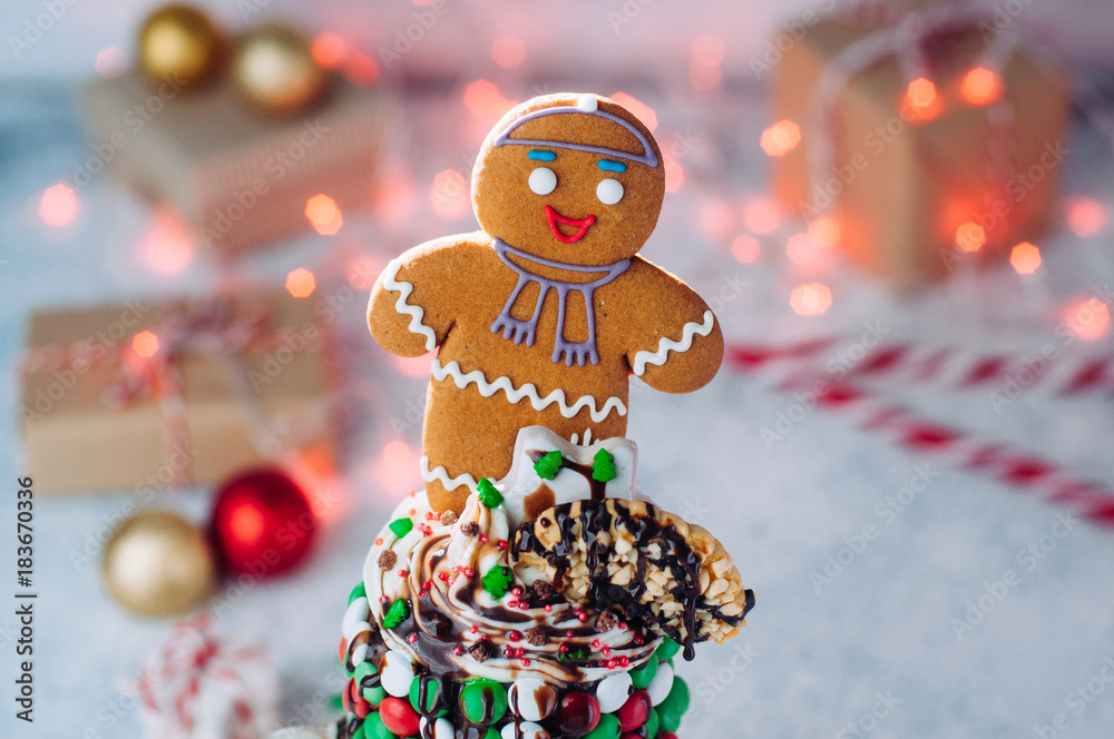 Close up of Christmas freak shake topping with gingerbread man