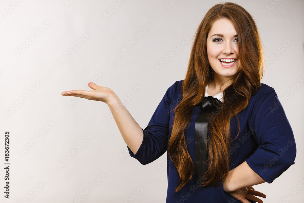 Happy elegant woman presenting copy space Happy elegant woman presenting copy space