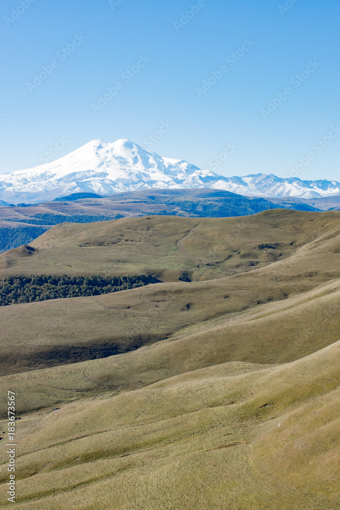 Landscape panorama Elbrus mountain with autumn hills Landscape panorama Elbrus mountain with autumn hills