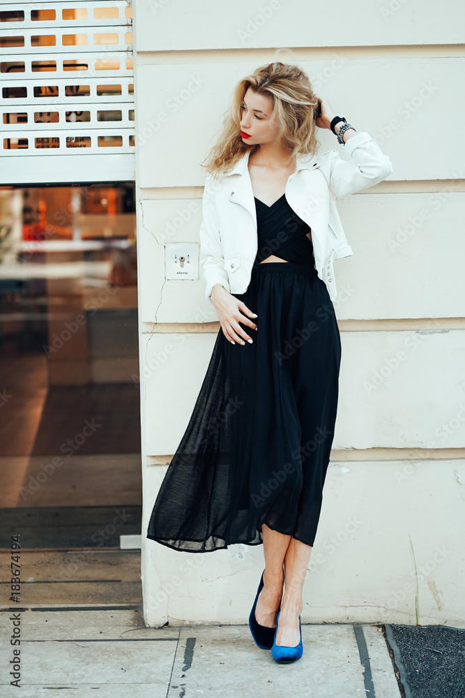 young beautiful woman in a black dress young beautiful woman in a black dress