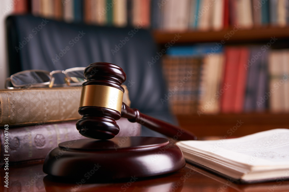 Judge's Gavel or mallet on wooden table Judge's Gavel or mallet on wooden table