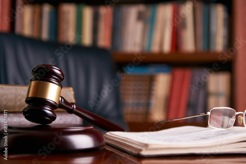 Judge's Gavel or mallet on wooden table