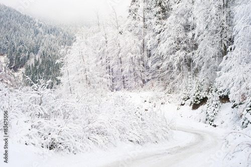 Mountains winter road cover...