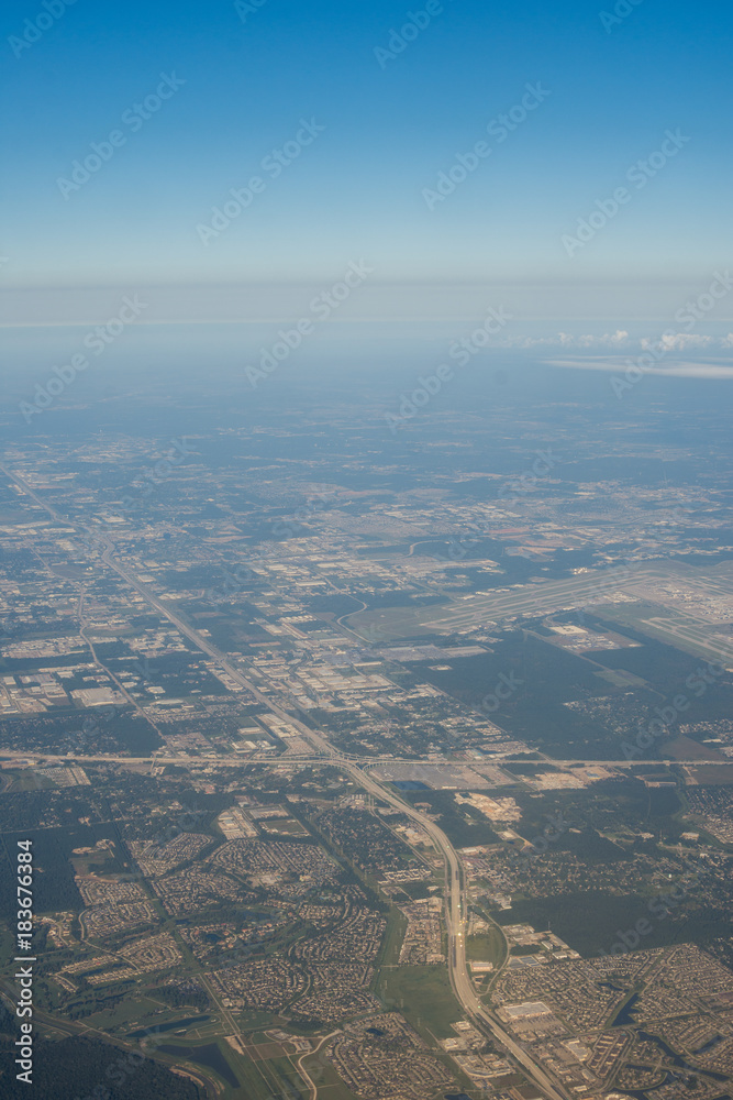 Metropolis Area of Houston, Texas Suburbs from Above in an Airplane Metropolis Area of Houston, Texas Suburbs from Above in an Airplane