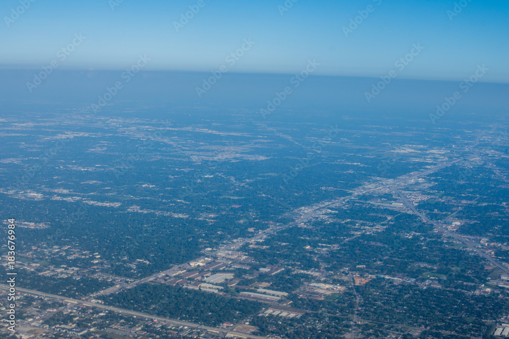 Metropolis Area of Houston, Texas Suburbs from Above in an Airplane