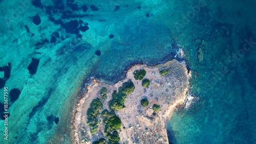 Fototapeta Naklejka Na Ścianę i Meble -  Autumn 2017: Aerial bird's eye view photo taken by drone depicting beautiful deep blue -  turquoise waters and rocky seascape