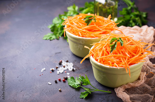 Fresh carrot salad on bowls