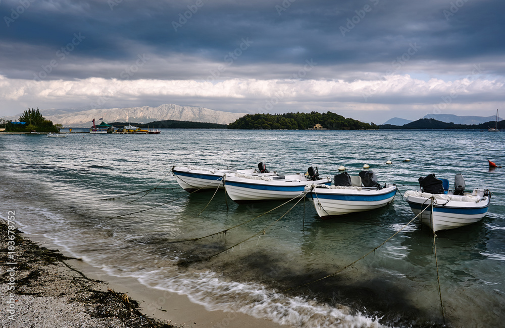motorboats in the port on the island of Lefkada in Greece. motorboats in the port on the island of Lefkada in Greece.