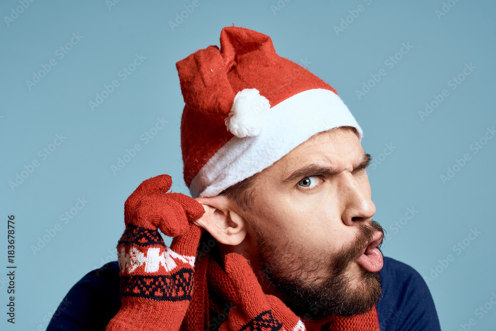 man pulls his ear, portrait, emotions, new year man pulls his ear, portrait, emotions, new year