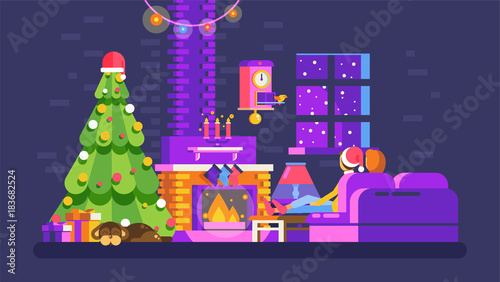 Christmas evening home interior, lovers sit on couch in front of fireplace in New Year Eve