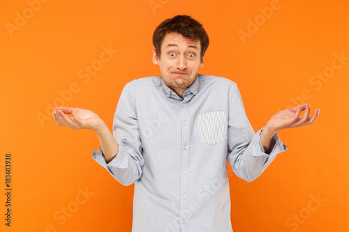 Obraz na plátne Who know's. Confused man looking at camera