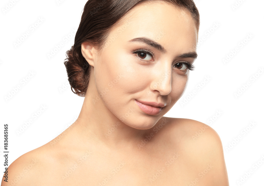 Portrait of beautiful young woman with eyelash extensions on white background Portrait of beautiful young woman with eyelash extensions on white background