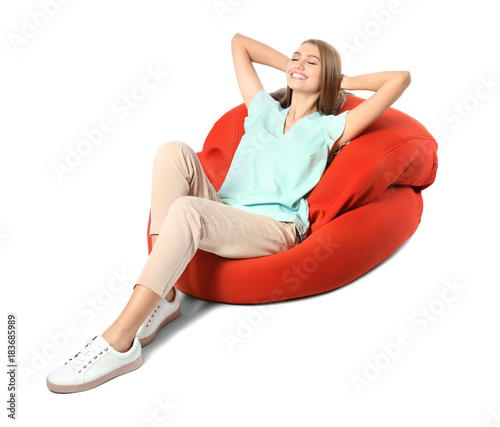 Happy young woman relaxing ...