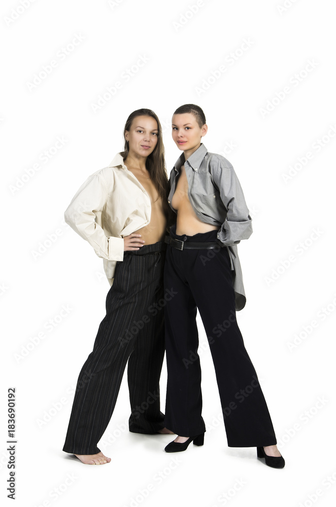Two Topless girls posing on a white background. Two Topless girls posing on a white background.