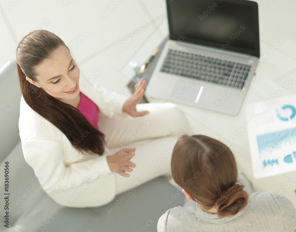 Bank staff are discussing financial documents Bank staff are discussing financial documents