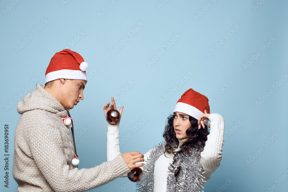light blue background, free space for copy, couple, new year, emotions, christmas balls, winter light blue background, free space for copy, couple, new year, emotions, christmas balls, winter
