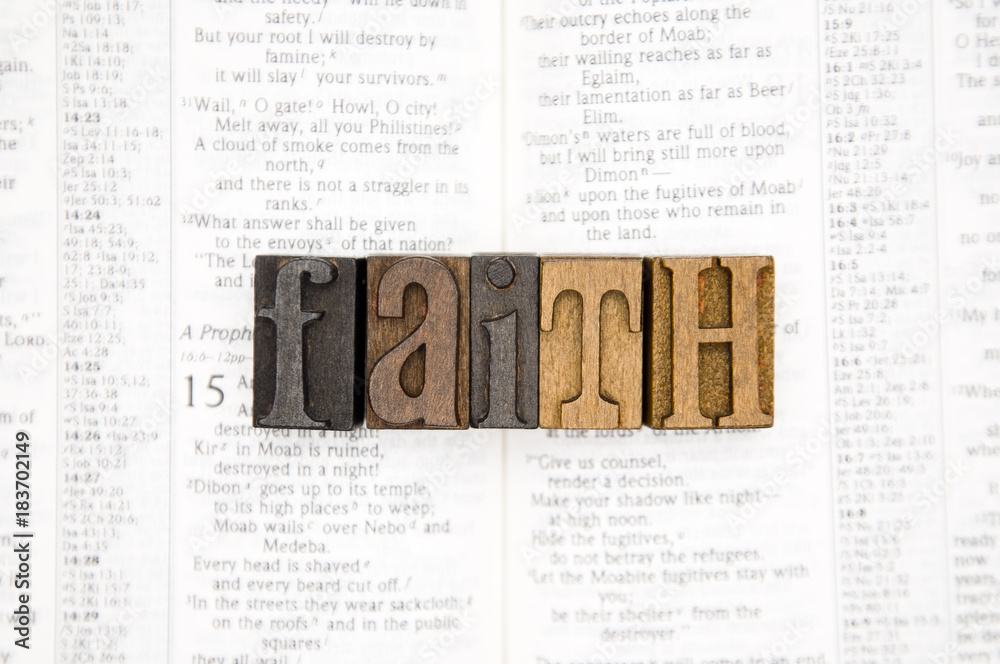 Fototapeta premium Faith on an Open Page of the Bible