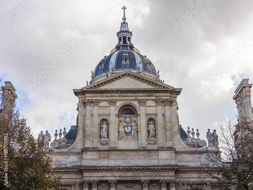 PARIS, FRANCE, on October 30, 2017. The sun lights a building pediment of the Sorbonne university photo