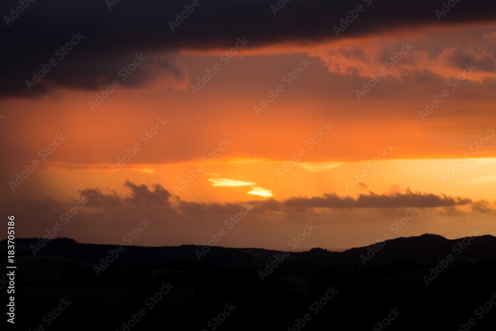 moody sunset dark horizon