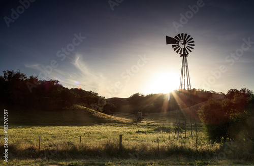 An old windmill still serves a purpose in Santa Ynez, California.