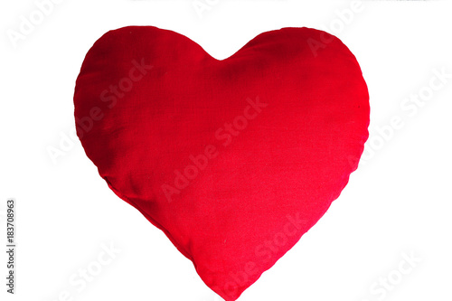 Valentines day illustration. Sign symbol of love. Fabric plush heart cushion to illustrate valentine's day or mother's day or any loving concept. Colored beautiful heart on isolated white background