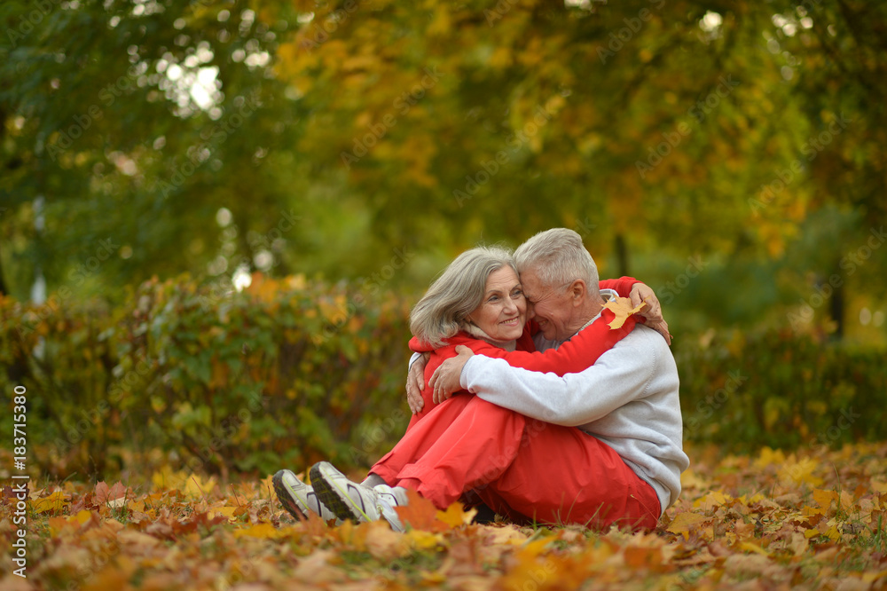 Senior couple relaxing in park Senior couple relaxing in park