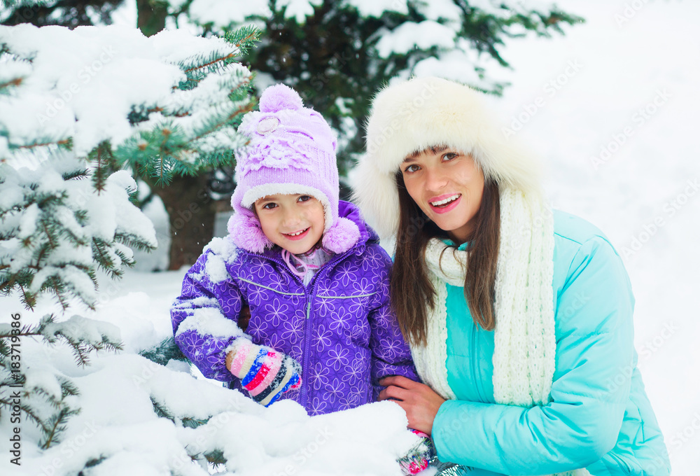 mother and daughter in winter