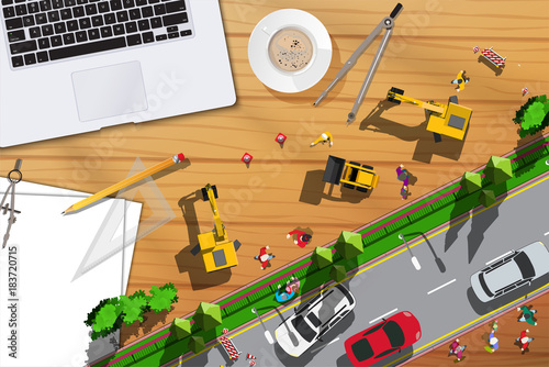 Top view wood table with small cars and notebook