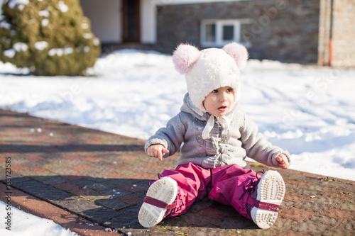 Fototapeta Naklejka Na Ścianę i Meble -  Winter walking of baby