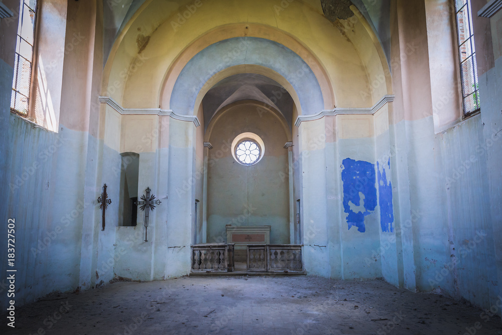 Nave of desolate and ruined Polish church in Ulashkivtsi village, Ukraine