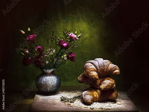 homemade croissants with floral decorations photo