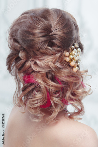 Beautiful air wedding hairstyle view from the back.