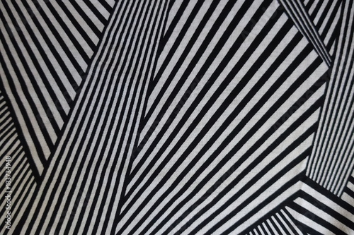 Fabric with black and white geometric print from above