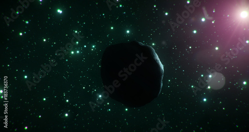 Fototapeta Naklejka Na Ścianę i Meble -  Dark side of an ice asteroid travels through the cold expanse of space on a backdrop of green stars