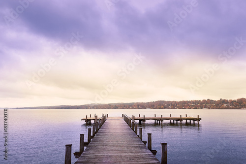 Empty wooden pier on Lake Starnberg in Bavaria, Germany © nedim_b